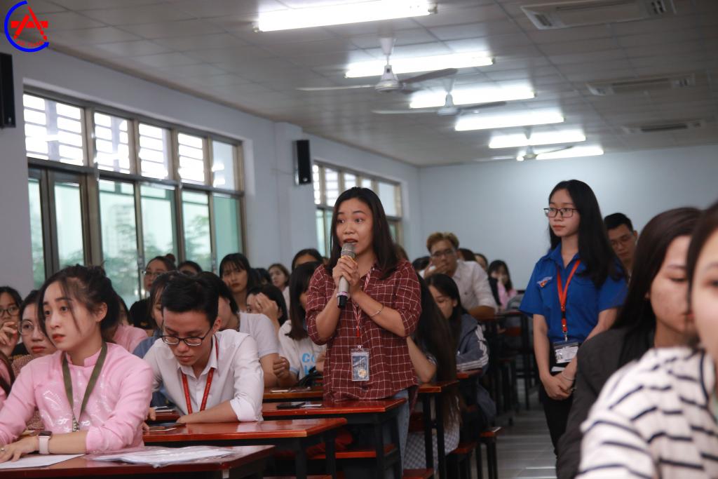 Student asking question during the Q&A session